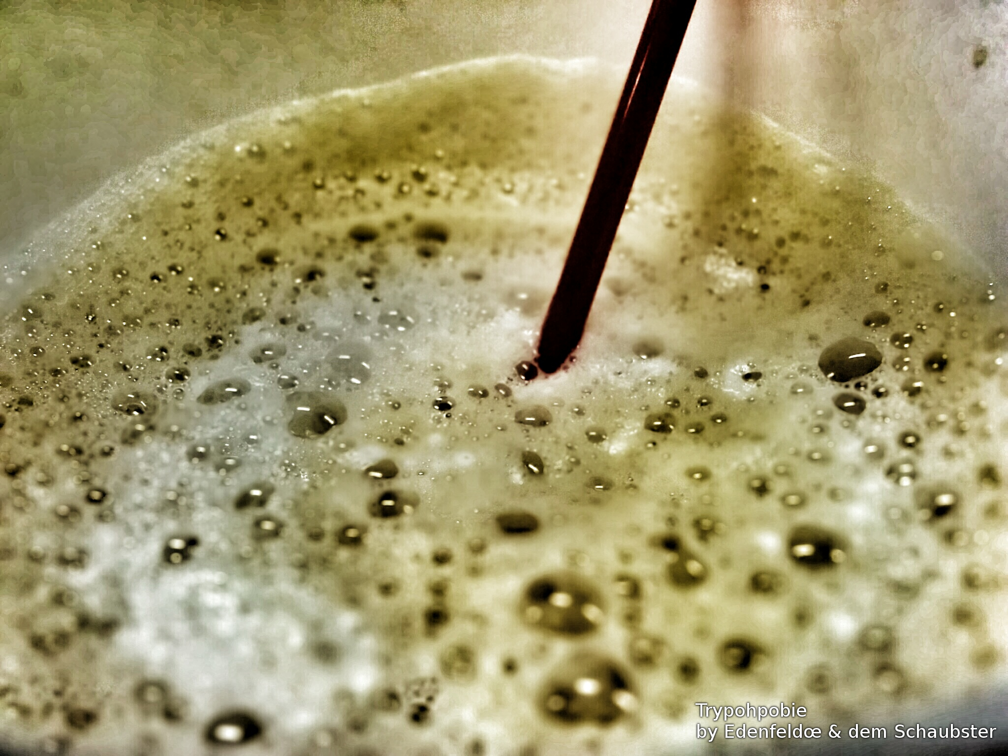 Closeup image of milk foam bubbles.